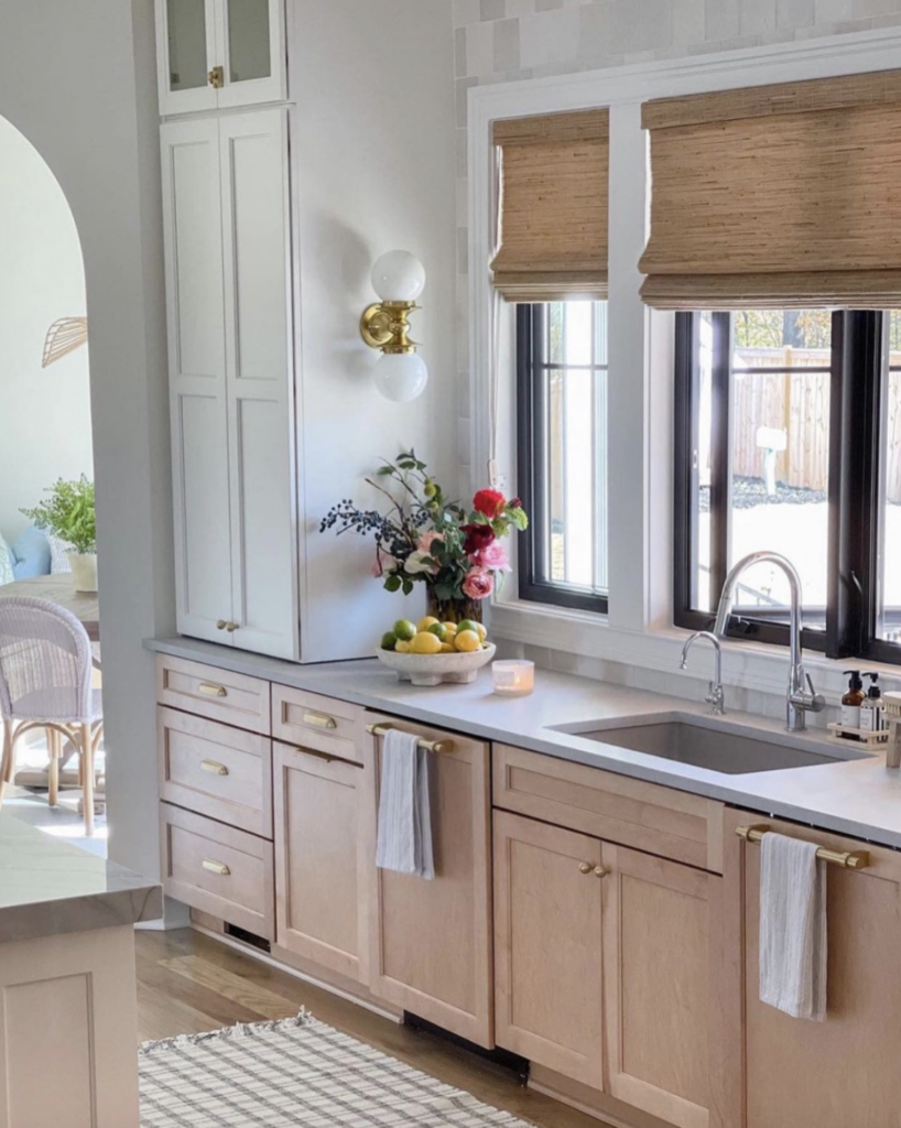 woven wooden shades over a kitchen window